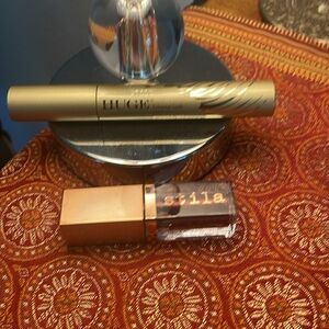 Stila liquid eyeshadow waterproof n long wearing along with Huge mascara Black